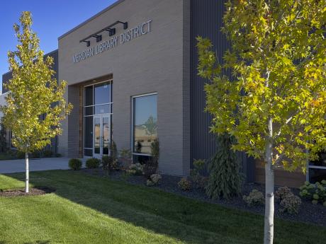 Pinnacle exterior building with golden leaves on trees